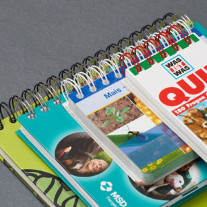 Wire-O Produkte Wire-O Produkte mit unterschiedlichen Drathfarben und Lochstanzungen